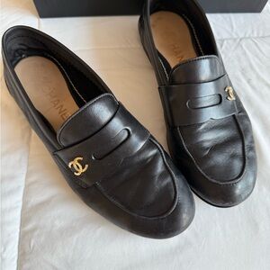 CHANEL Black Leather Loafers with Gold Logo